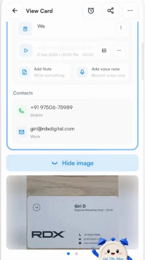 The original card is saved with the contact.